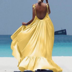 New without tags Yellow flowy open back beach dress Size S